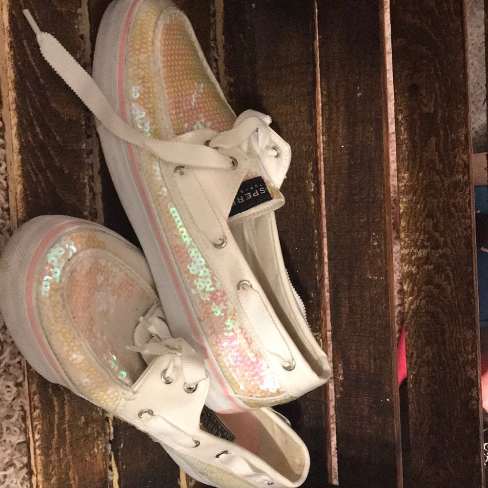 White sequins Sperry shoes.